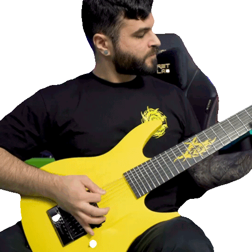 Andrew Baena Playing Yellow Electric Guitar