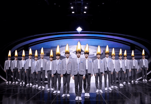 Boys Planet Trainees with Glowing Headpieces